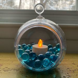 Terrarium centerpiece with blue marbles